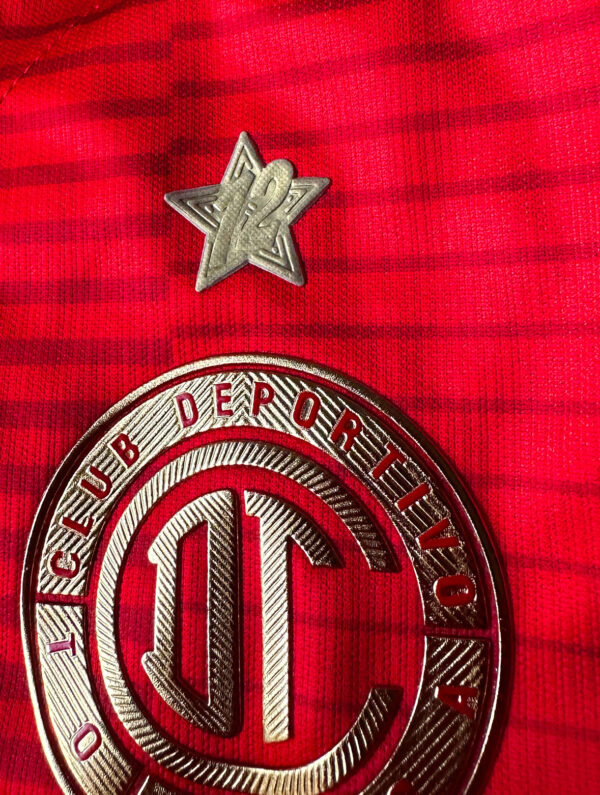 Playera Toluca Local Parche Bicampeón Estrella 12 New Balance
